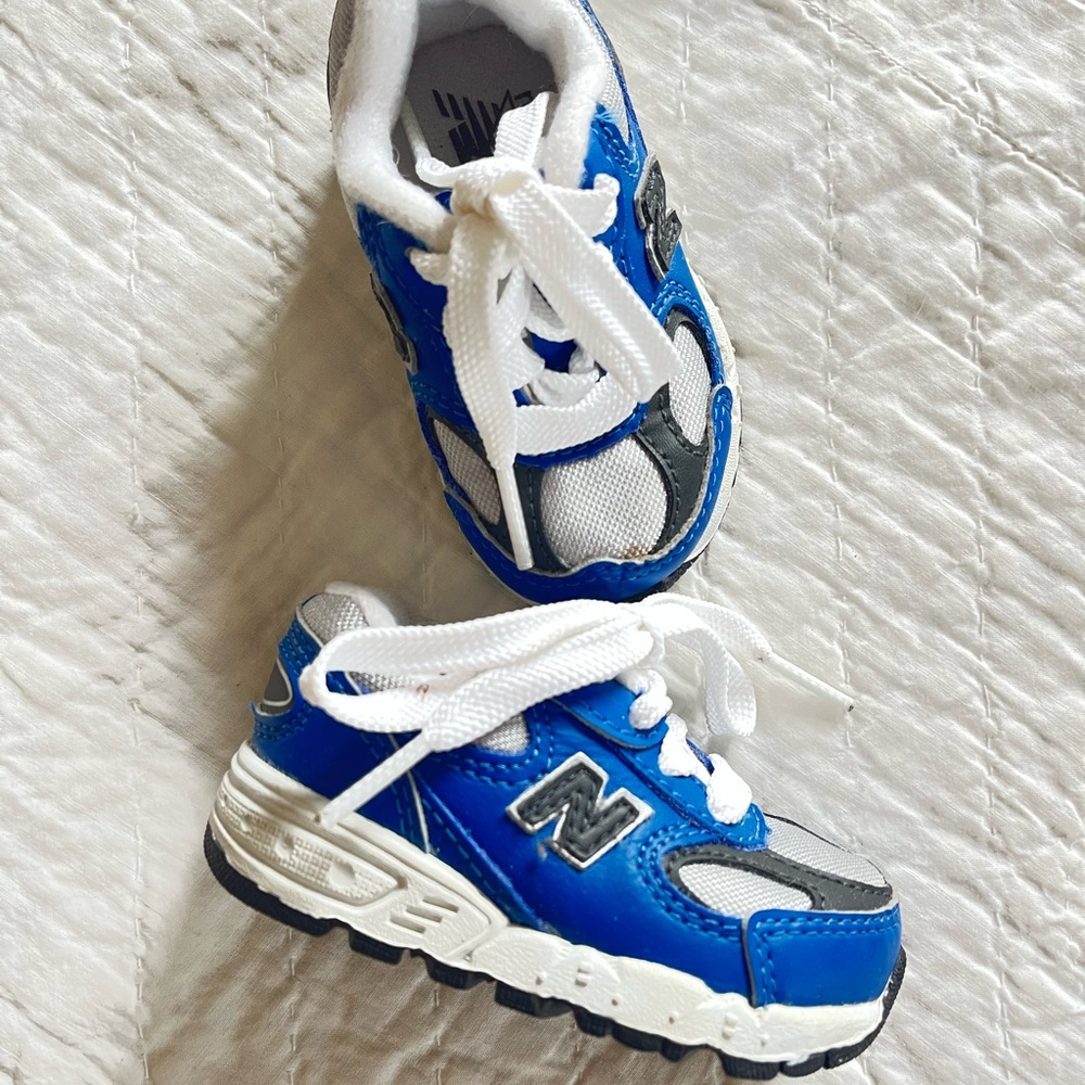 New Balance Kids Blue and White Sneakers